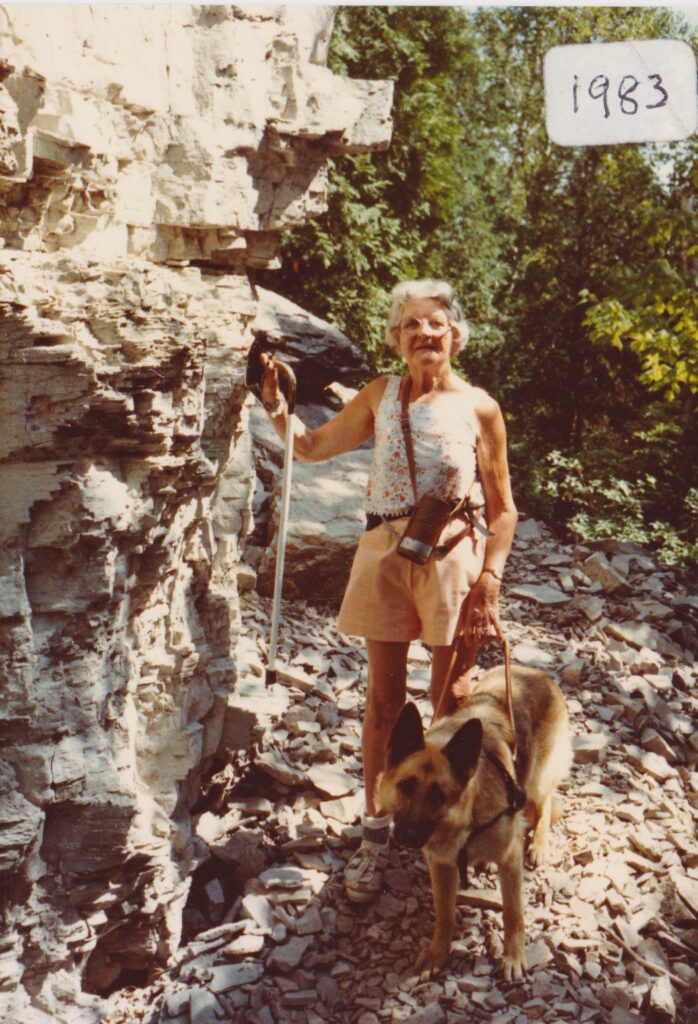 Ruth Hussey on a hike with her dog