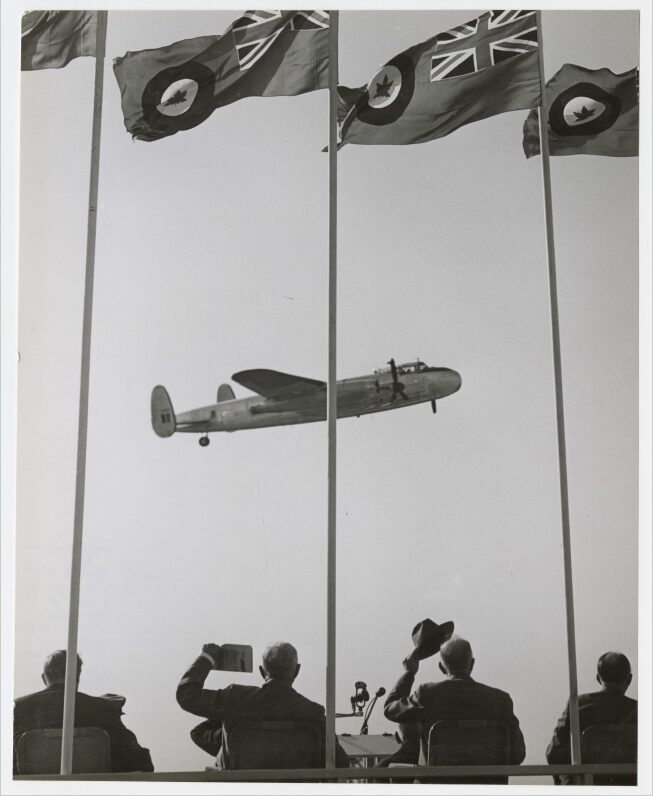 Spectators watch Avro CF-100 Canuck fly-by